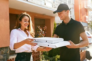 Pizza-Delivery-to-Smiling-Female